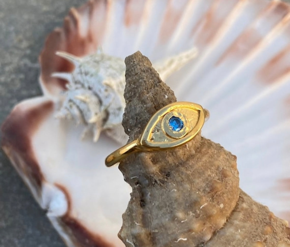 evils eye ring gold with blue gemstone