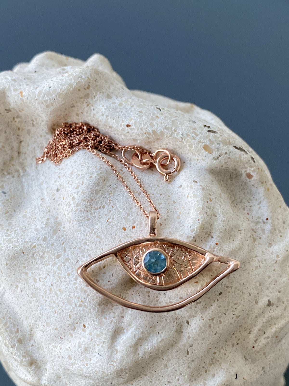 rose gold evil eye necklace with blue gemstone handmade