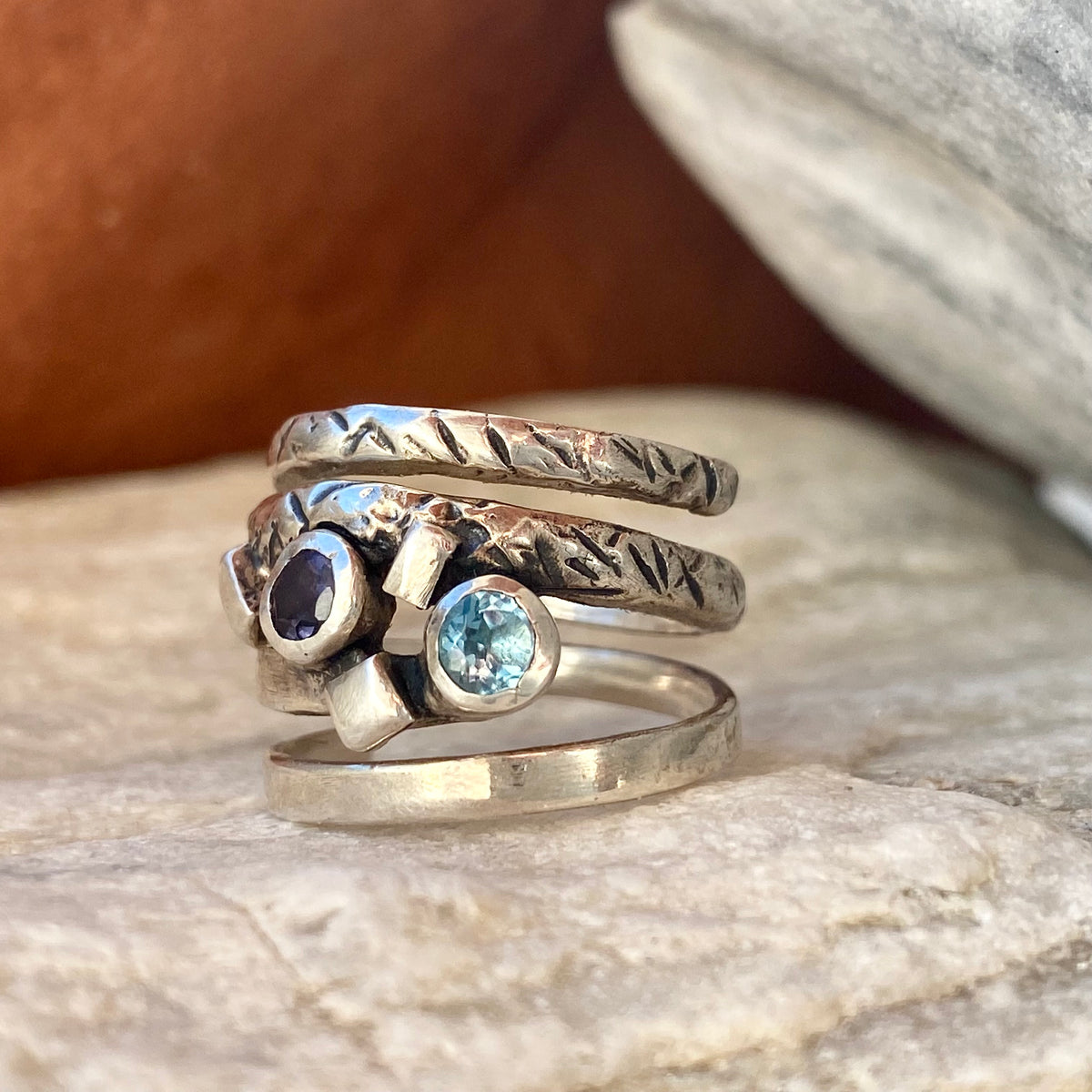 Silver spiral ring with blue gemstones, silver spring ring