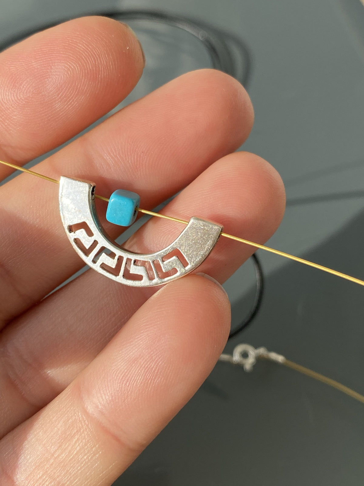 Greek key necklace with turquoise on a stainless steel wire