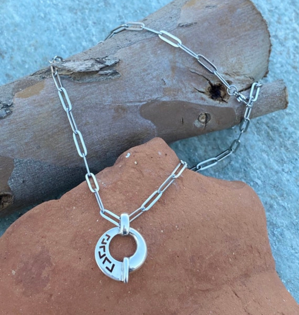 Greek key necklace circle shape with a stainless steel paperclip chain