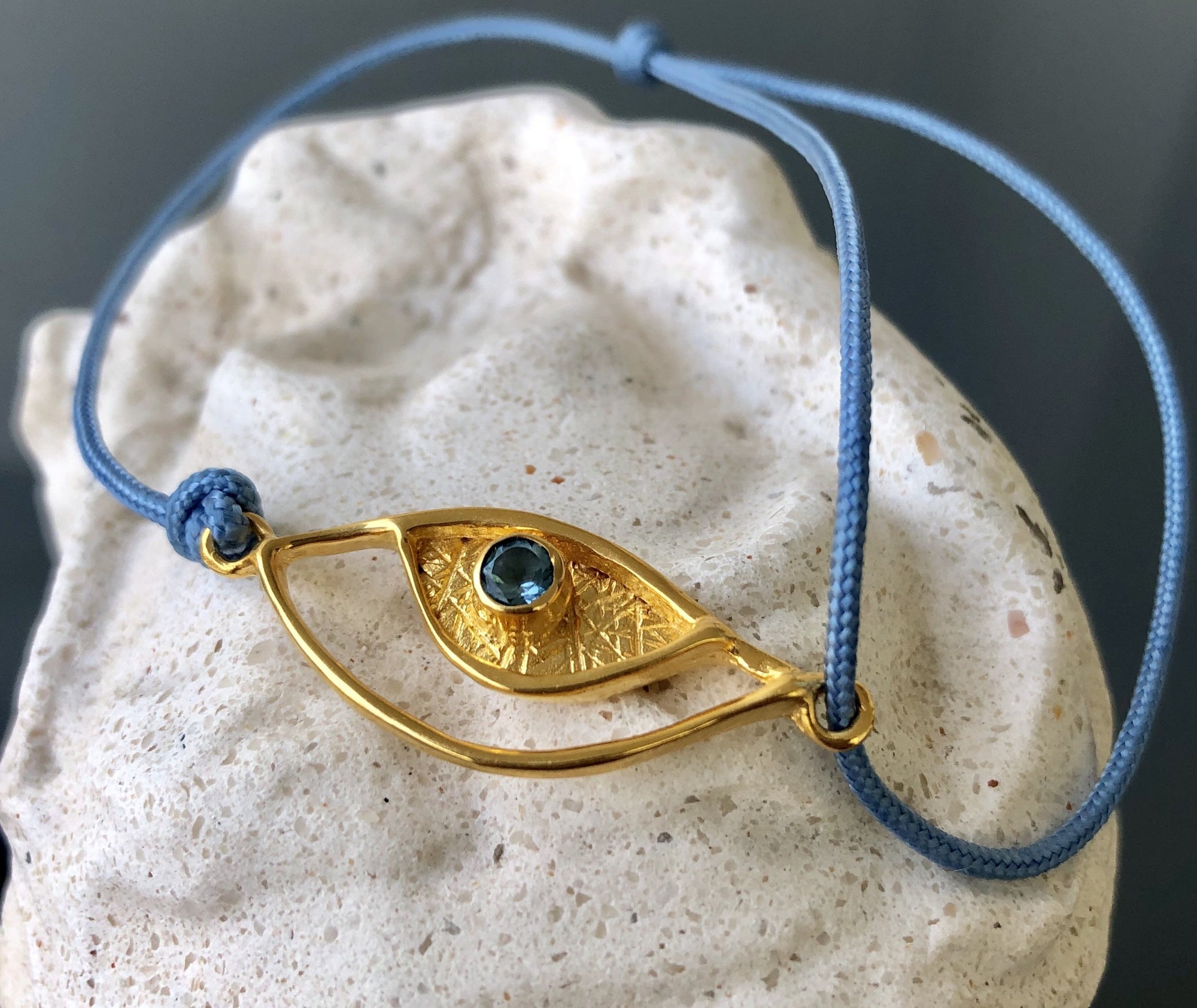 Evil eye bracelet gold, blue topaz gemstone blue nylon cord 