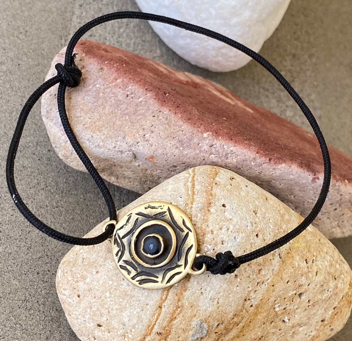 evil eye bracelet brass with black gemstone