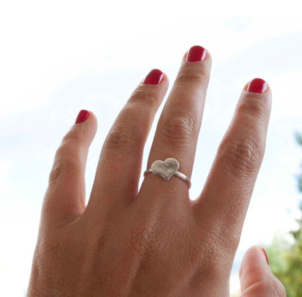 silver heart ring textured