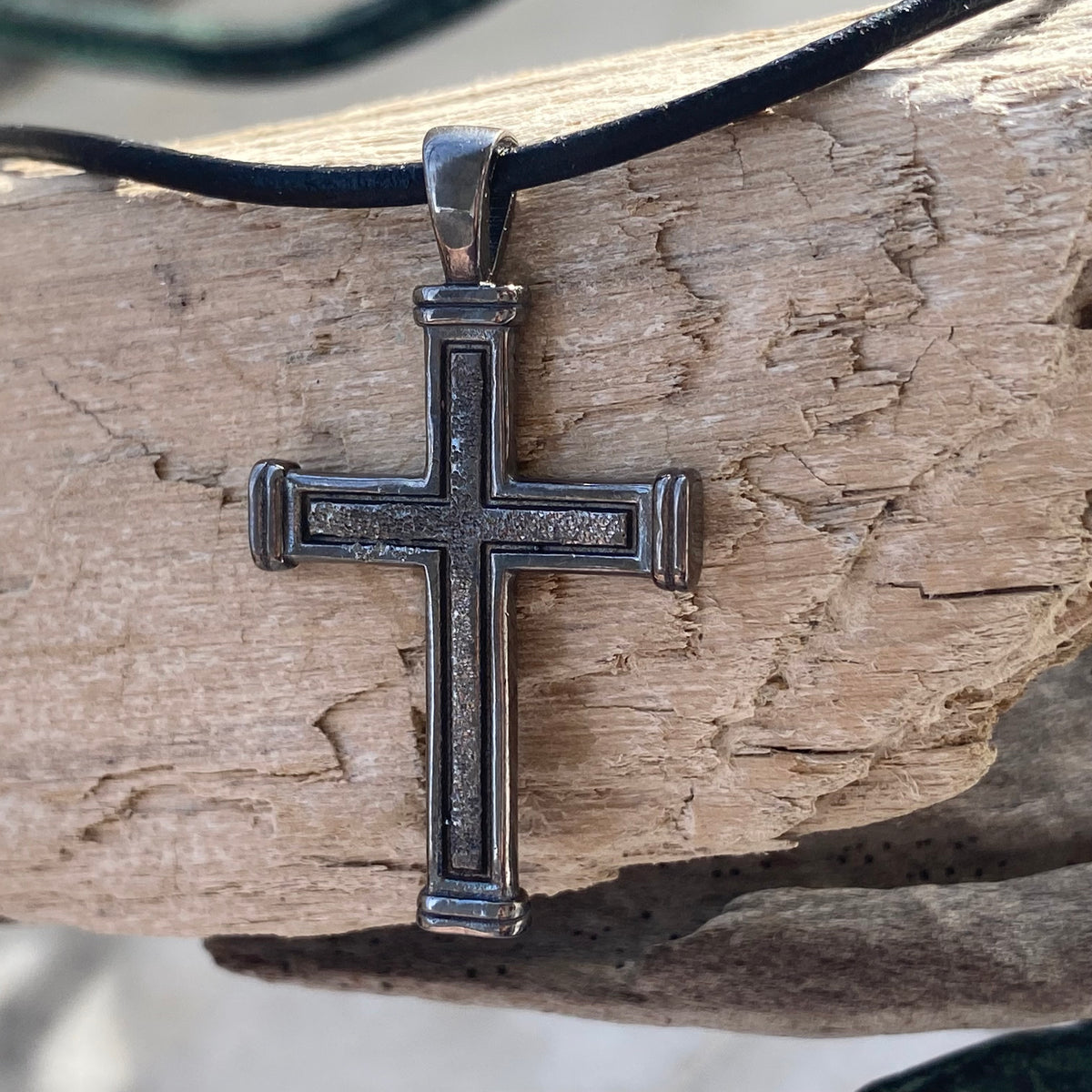 Men&#39;s black cross necklace with leather cord