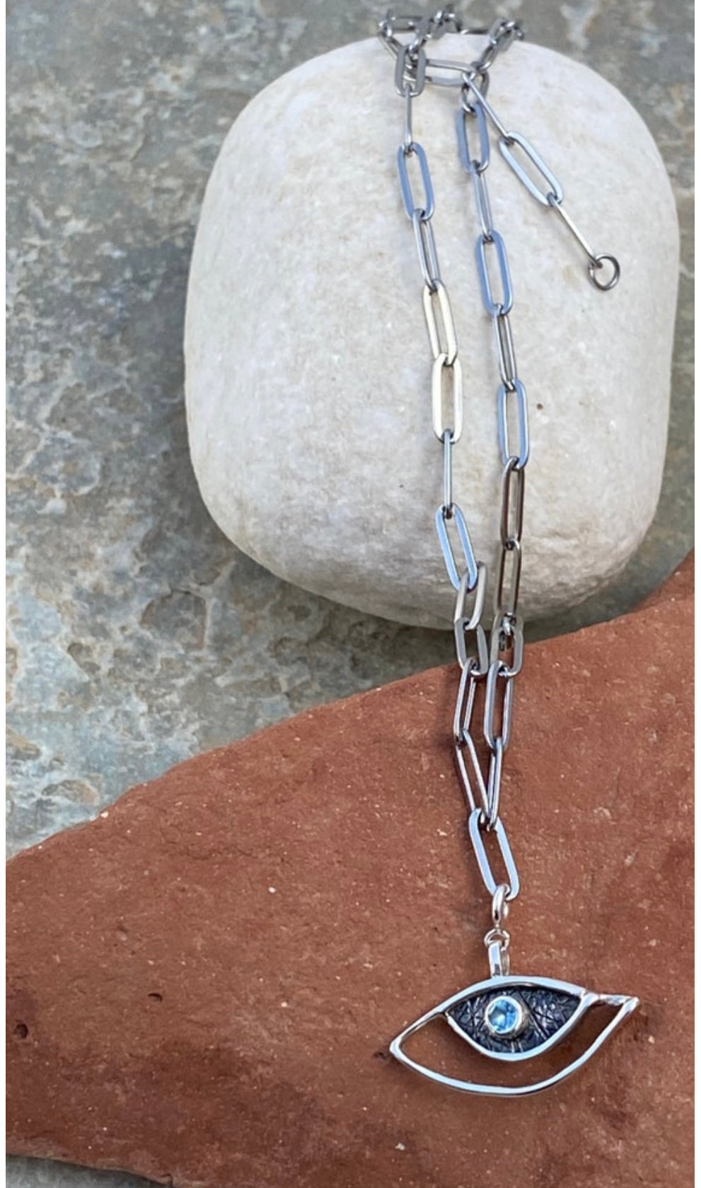 evil eye necklace with a paperclip chain