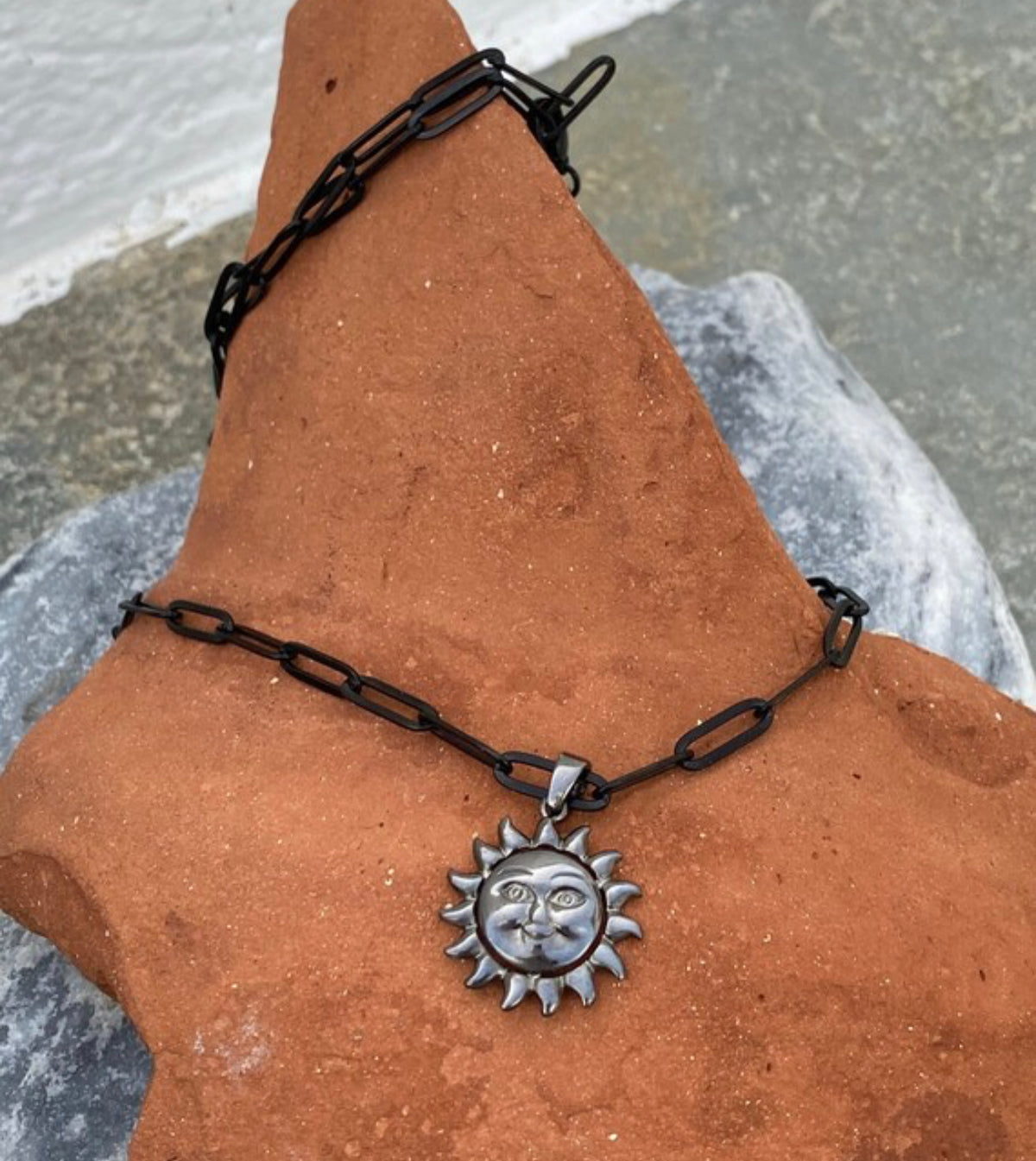 black sun necklace silver smiling sun with paperclip chain