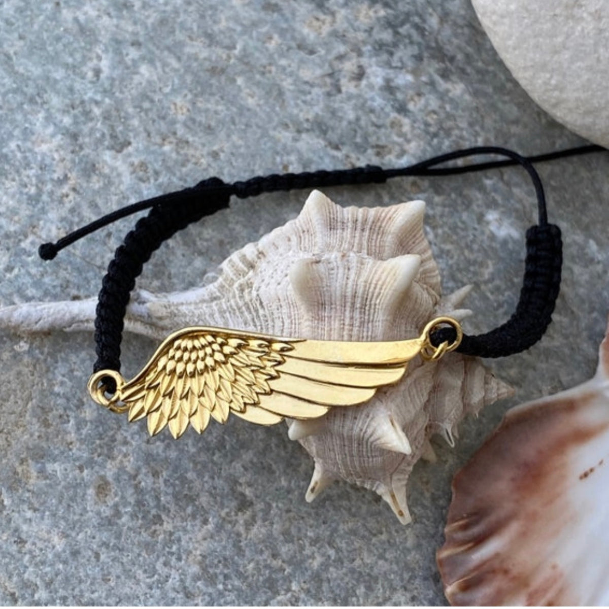 gold angel wing bracelet