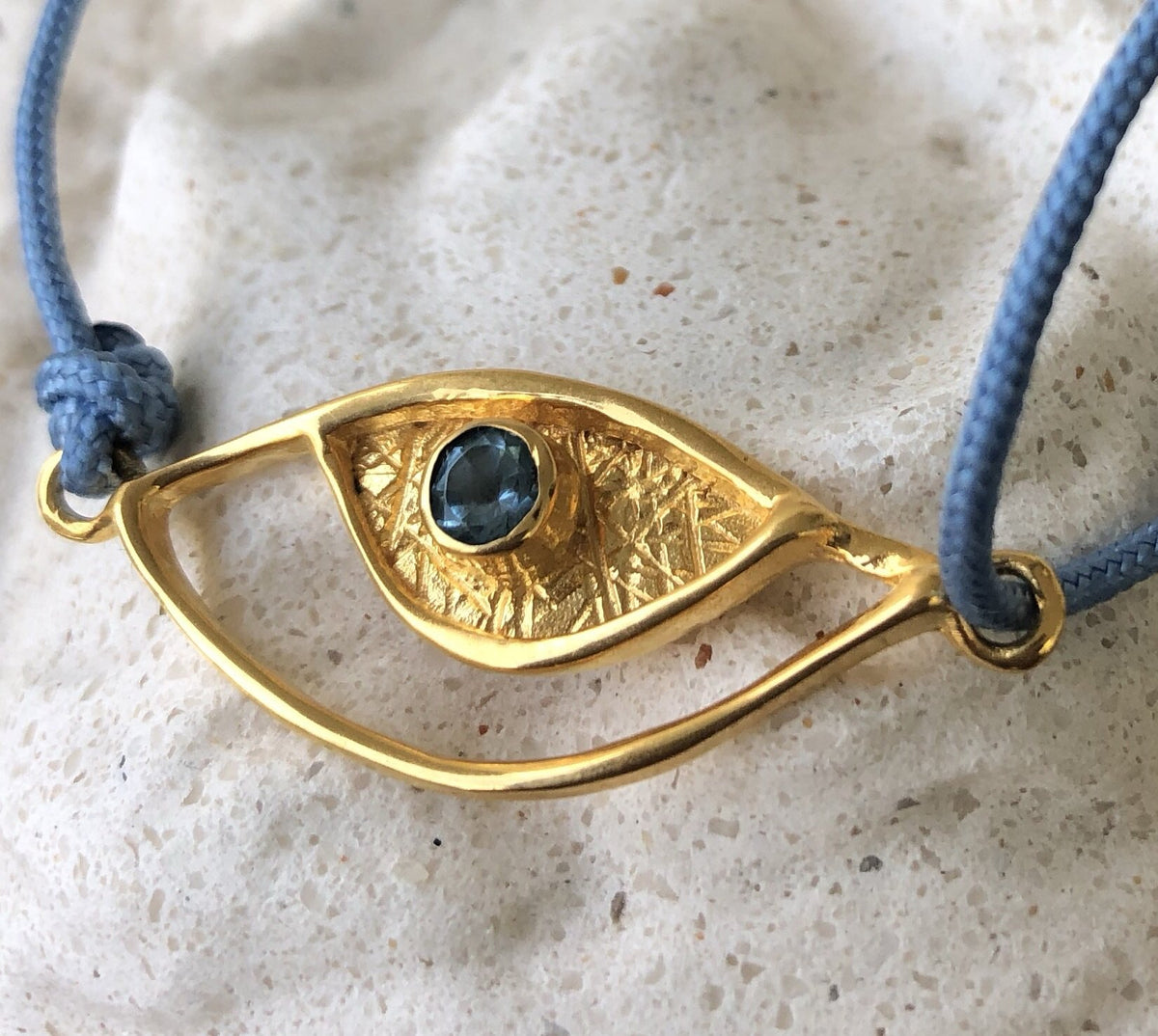 Evil eye bracelet gold, blue topaz gemstone blue nylon cord 