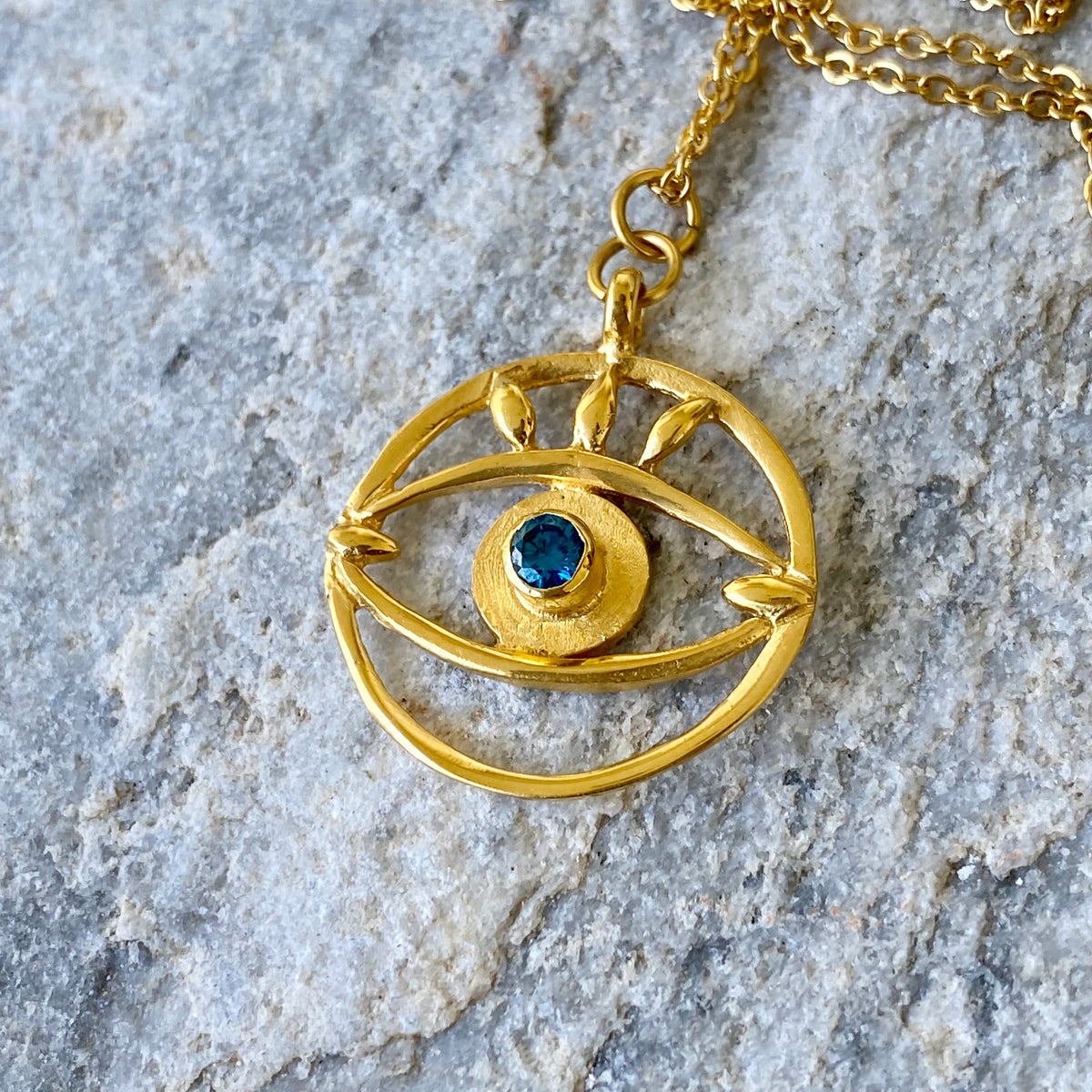 Evil eye necklace gold with blue gemstone