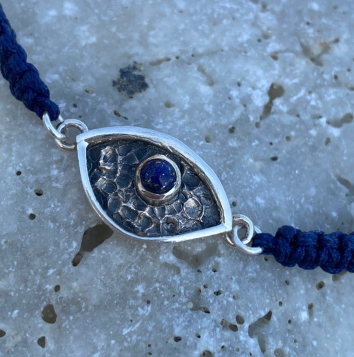 Evil eye bracelet with blue stone blue macrame