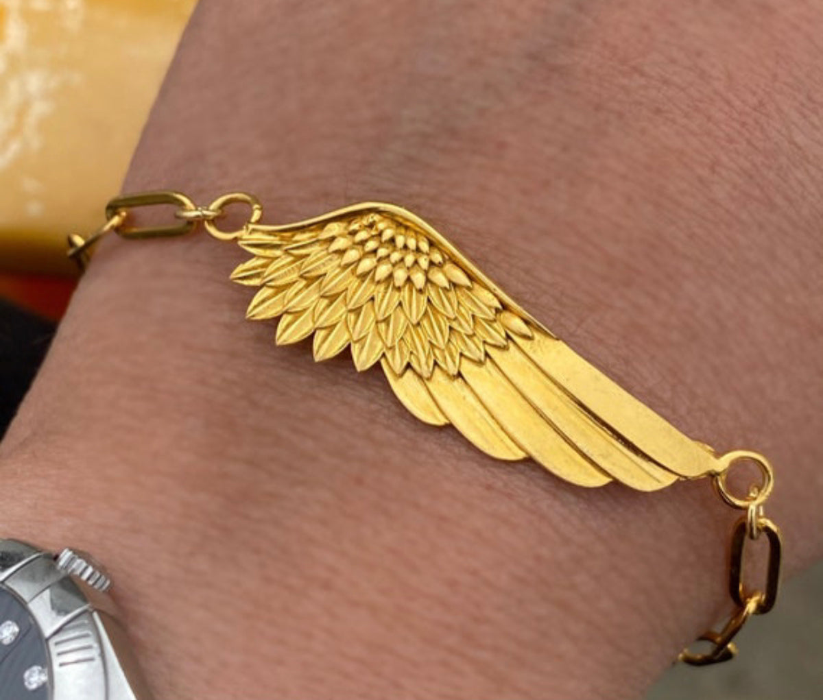 Angel wing bracelet gold