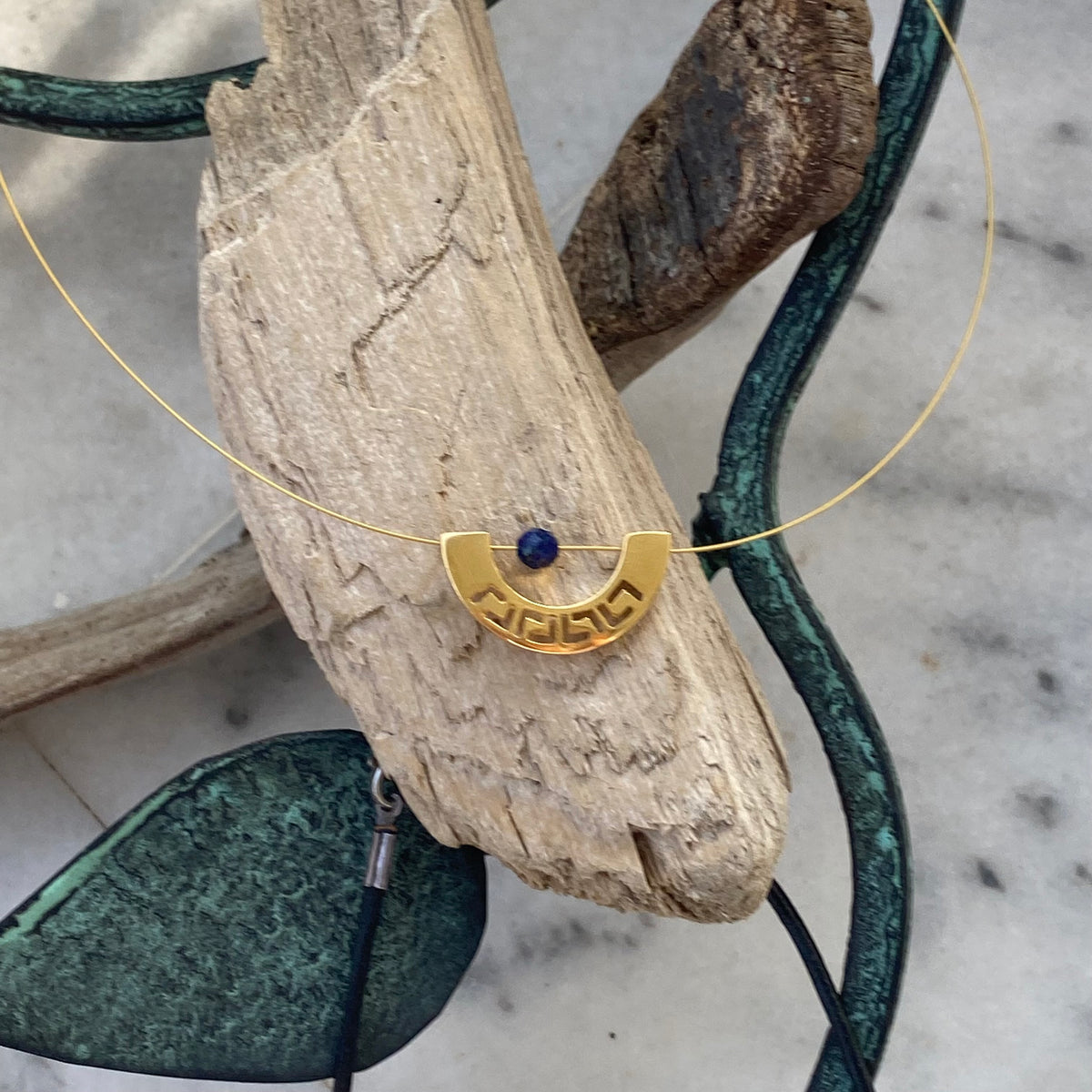 greek key choker necklace gold with a blue lapis