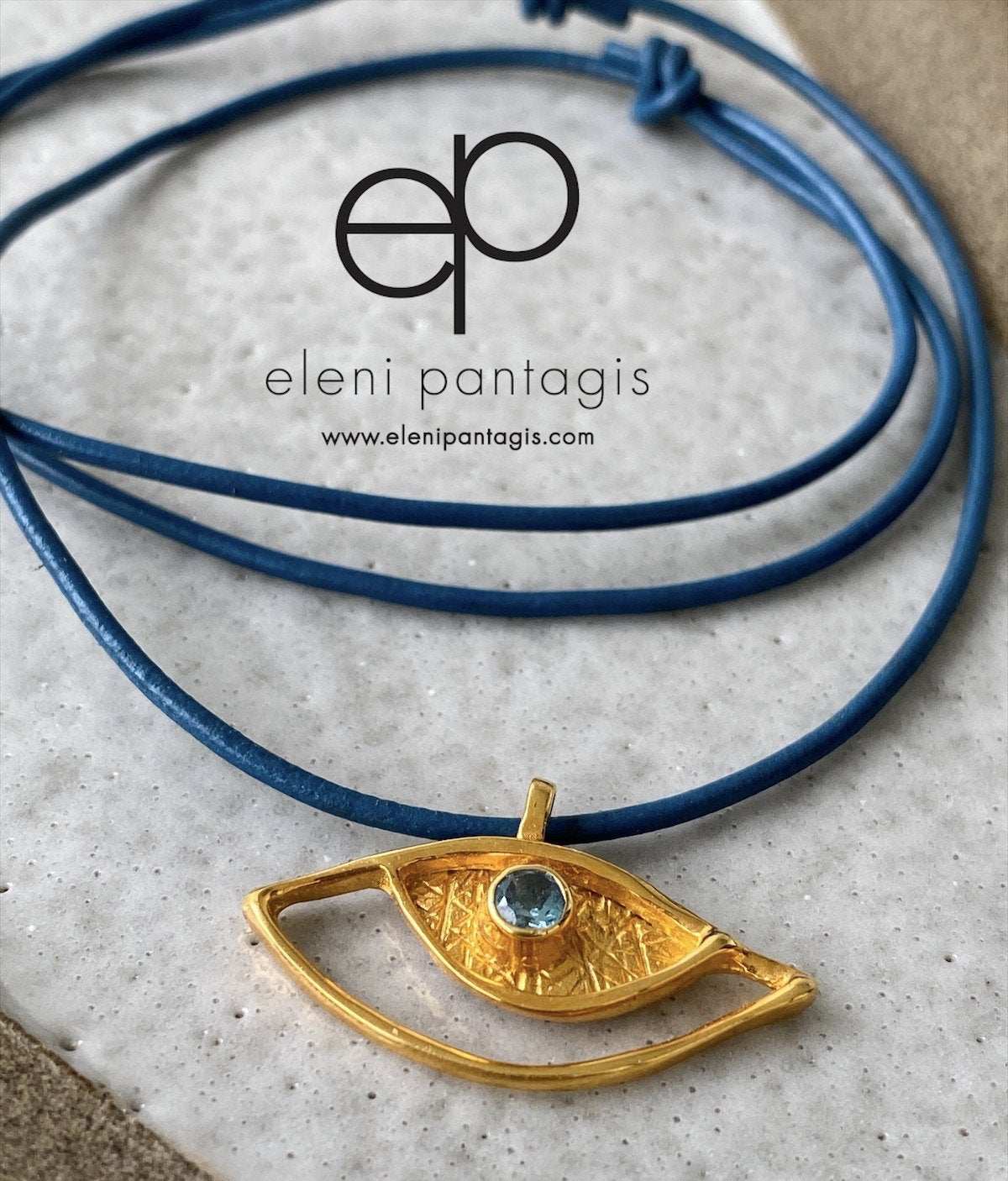 Evil eye pendant gold, sterling silver blue topaz gemstone evil eye 