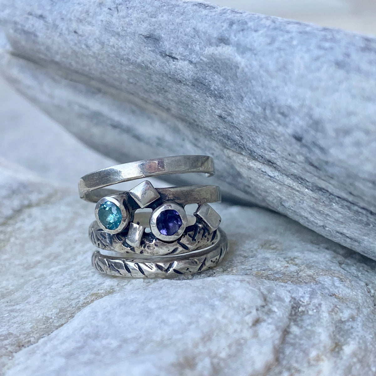 Silver spiral ring with blue gemstones, silver spring ring