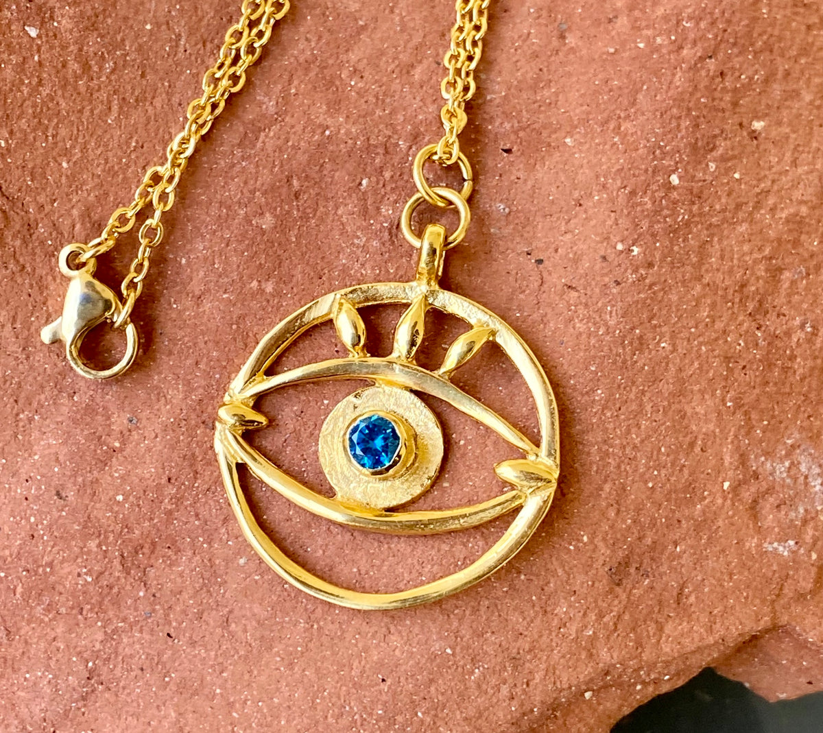 Evil eye necklace gold with blue gemstone