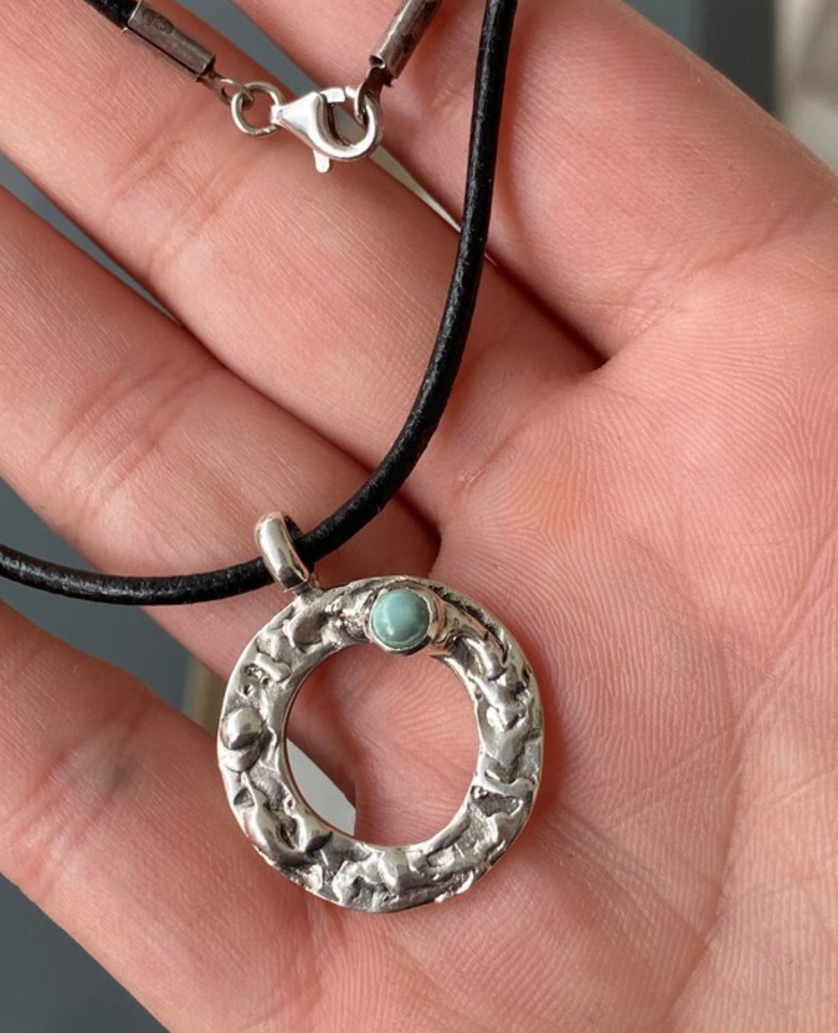 handmade circle necklace with a turquoise gemstone