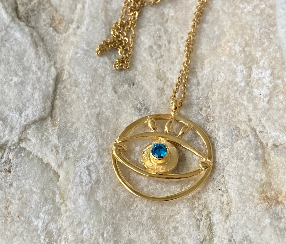 Evil eye necklace gold with blue gemstone