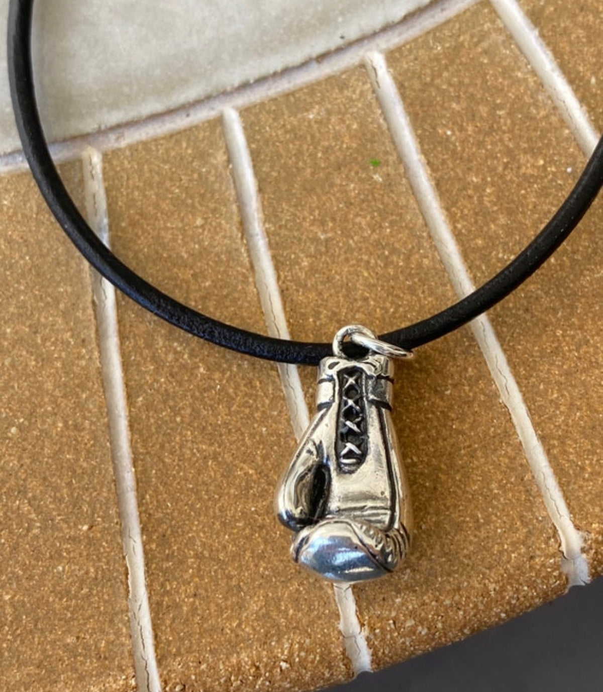 silver boxing glove with paperclip chain