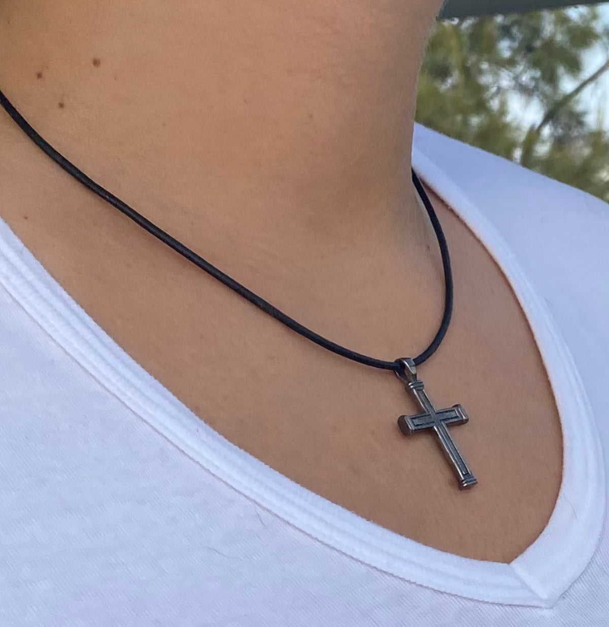 Men&#39;s black cross necklace with leather cord