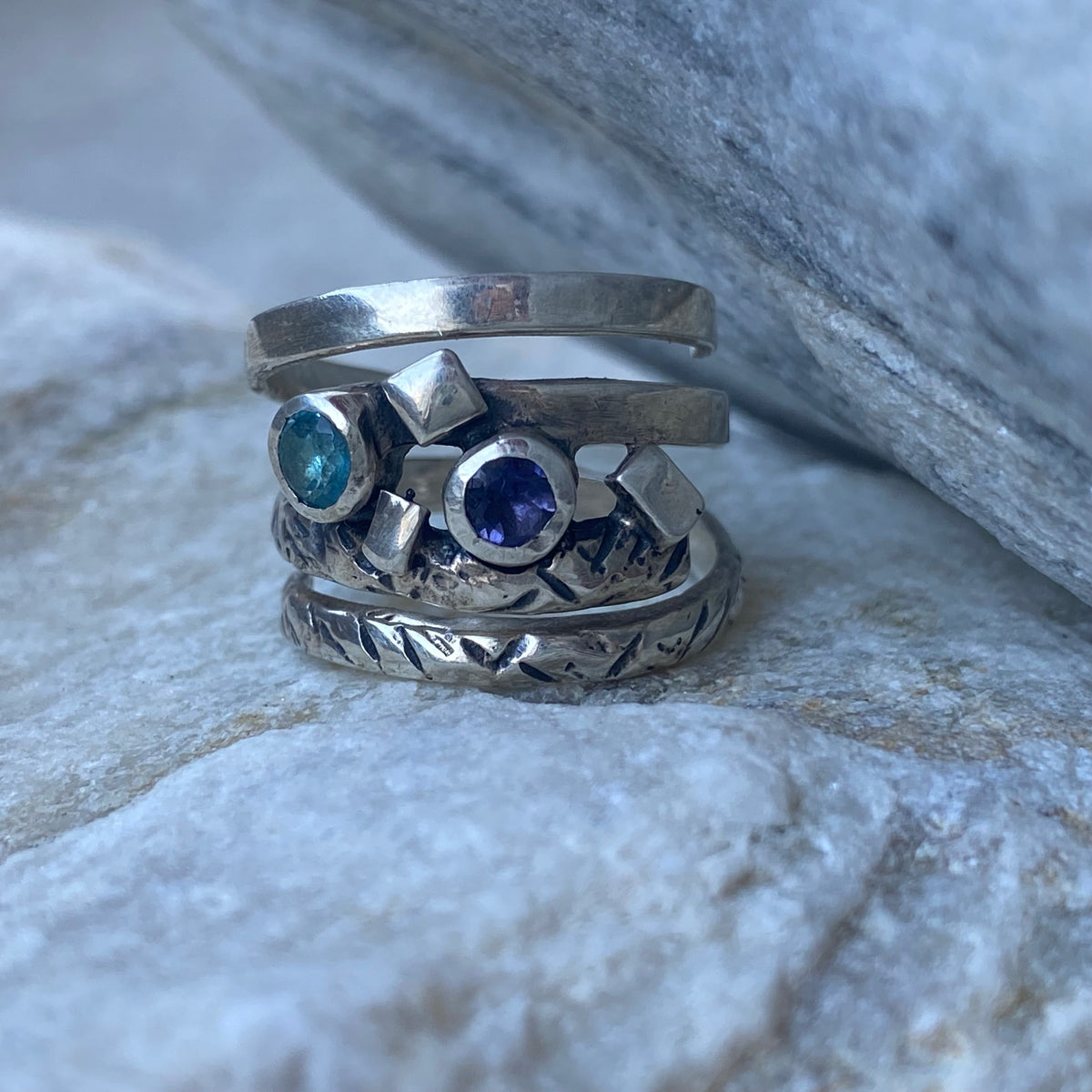 Silver spiral ring with blue gemstones, silver spring ring