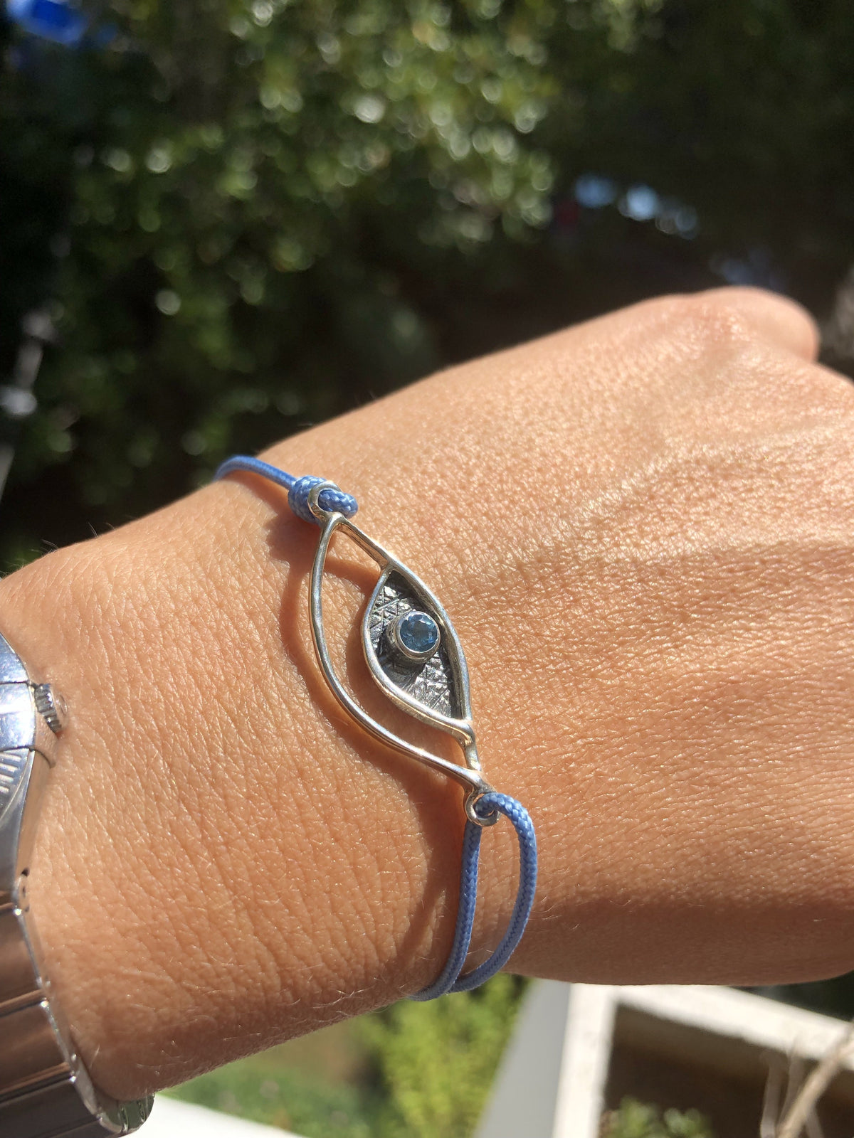 Evil eye bracelet silver, blue topaz gemstone blue nylon cord 