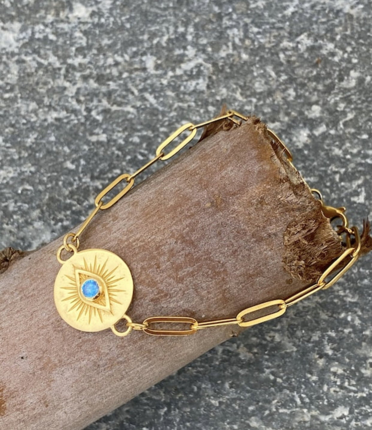 Evil eye bracelet gold with blue gem paperclip chain