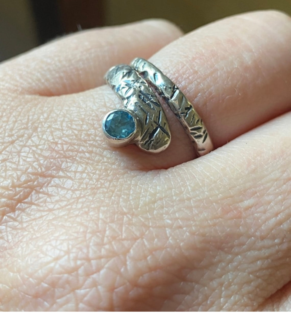 silver spiral ring, blue topaz ring