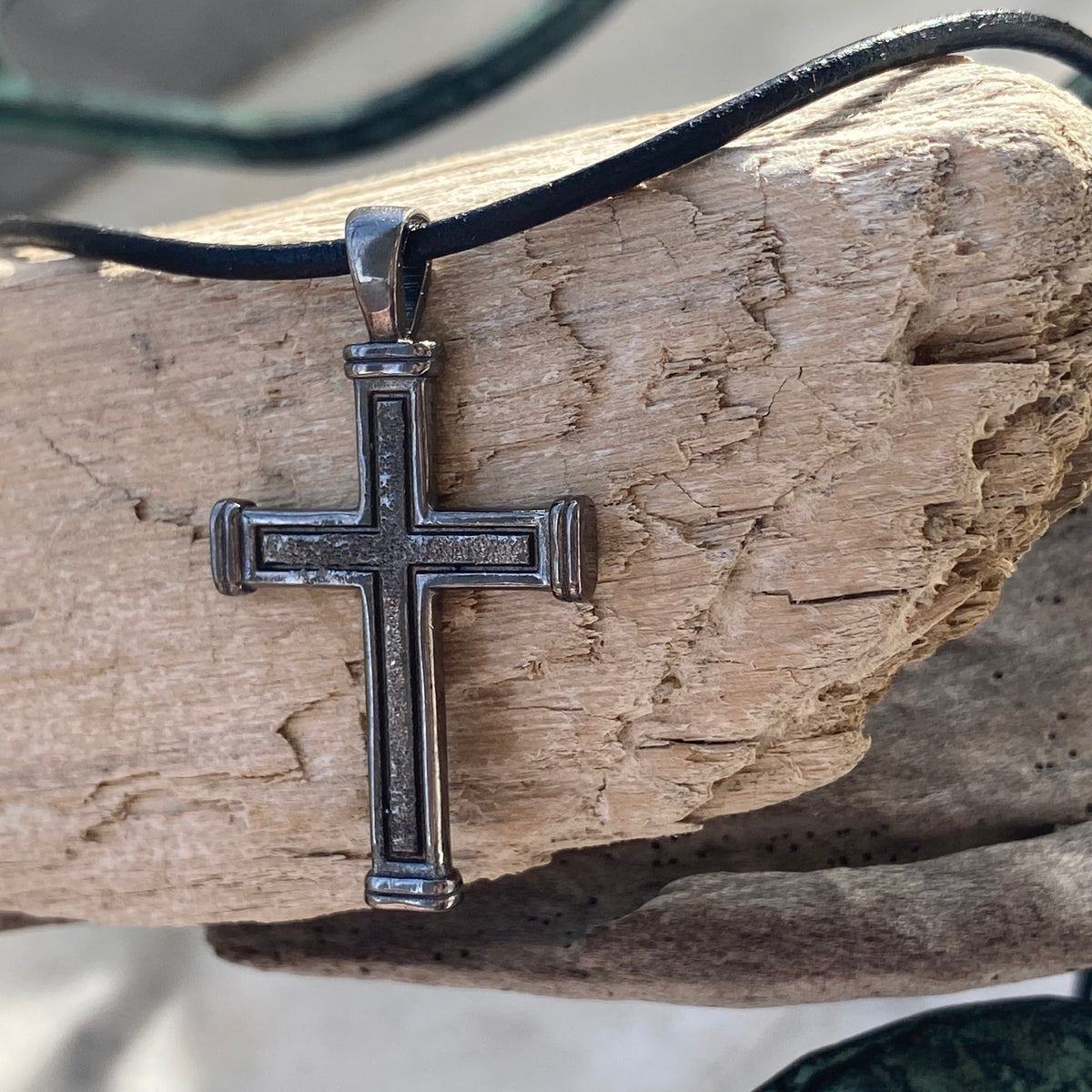 Men&#39;s black cross necklace with leather cord