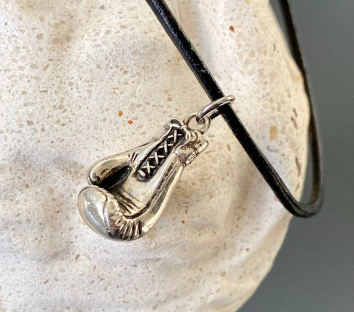 silver boxing glove with paperclip chain