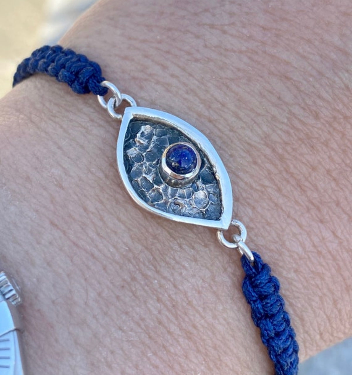 Evil eye bracelet with blue stone blue macrame