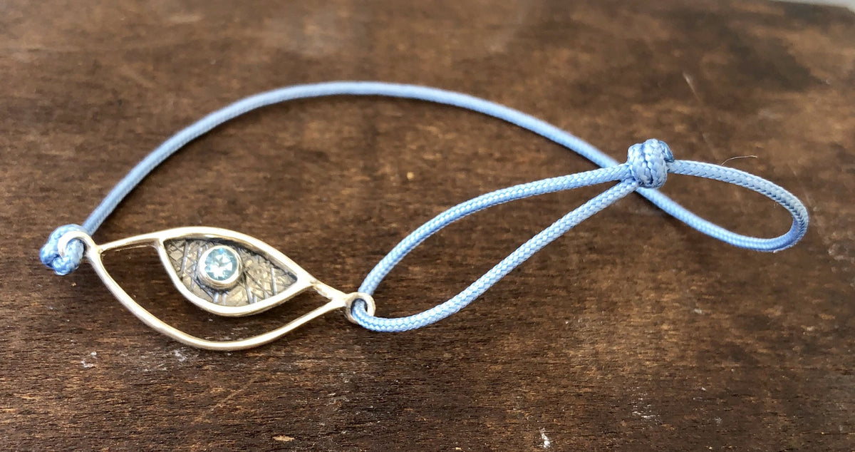 Evil eye bracelet silver, blue topaz gemstone blue nylon cord 